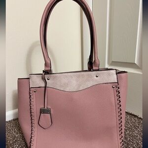 New never used pink woman purse.